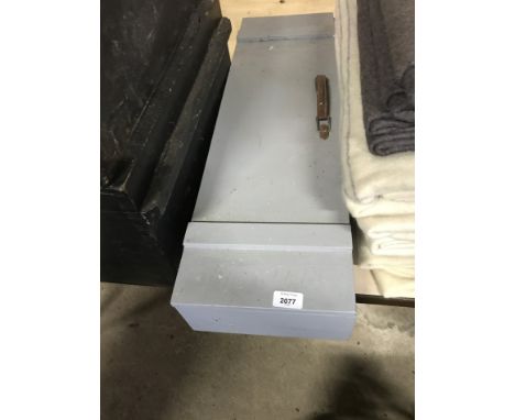 A grey wooden tool or ammunition box