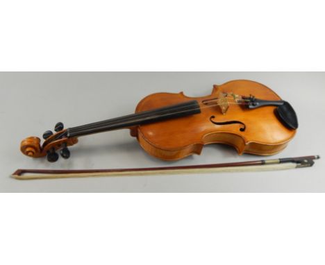 A viola by Tom Wilson of Grimsby, dated 1949, one piece back, length of back 41cm, in a fitted case with bow