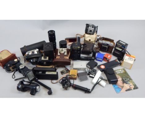 A Yashica Matt-124G camera, various other cameras, a Soligor Auto Zoom lens, etc.