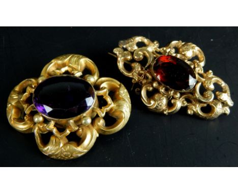 Two 19thC brooches, each mounted in yellow coloured metal, one mounted with an amethyst, the other a citrine.