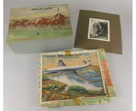 A Chad Valley Escalado game boxed, and a Victory Wood jigsaw puzzle of B.O.A.C Comet Jet over the Victoria Falls.