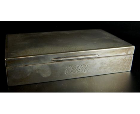 A George VI engine turned rectangular silver cigarette box, Birmingham 1937 by Walker & Hall, engraved D.R.