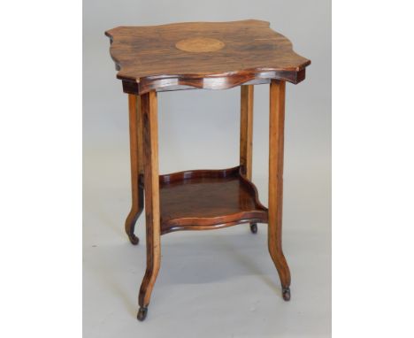 An Edwardian rosewood occasional table, the rectangular top with a shaped edge, boxwood strung border, and a central maple pa