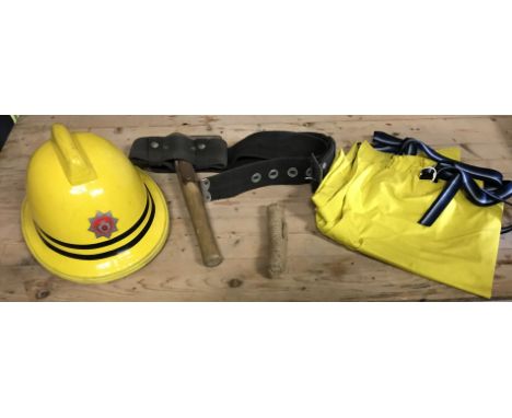 A Hampshire Fire Brigade group, including axe, belt, helmet, safety line and trousers