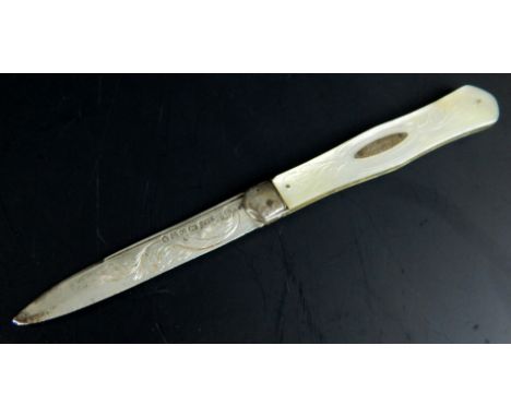 A Victorian silver and mother of pearl fruit knife, the handle engraved C Radford