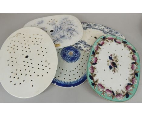 Various 19thC ceramic drainers, to include a Chinese export example, a Hawthorne pattern piece, etc. (AF)