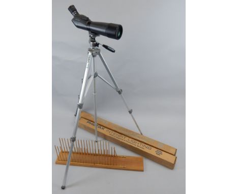 A Opticron ES80 GA waterproof telescope, on an associated tripod.
