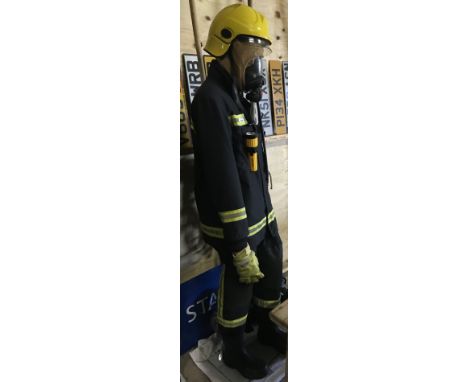 A fireman mannequin, equipped in full suit 