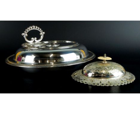 A silver plated oval entree dish and cover, and a Victorian butter dish with liner and ivory knop.