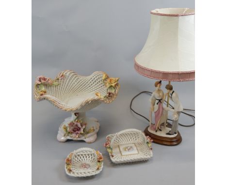 A collection of Italian ceramics, etc., to include a large pierced flower encrusted centrepiece, to similar baskets and a Cap