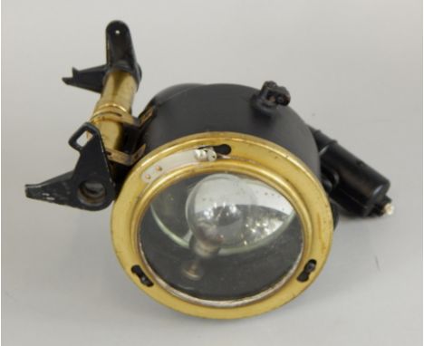 A WWII brass and ebonised signalling lamp. (AF)