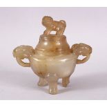 A CHINESE 19TH CENTURY CARVED JADE OR HARDSTONE CENSER & COVER, with twin carved beast handles, upon