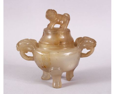 A CHINESE 19TH CENTURY CARVED JADE OR HARDSTONE CENSER &amp; COVER, with twin carved beast handles, upon three feet, with a l
