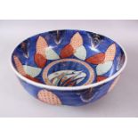 A JAPANESE MEIJI PERIOD ARITA / IMARI PORCELAIN PUNCH BOWL, decorated with floral motif with a