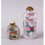 TWO CHINESE REVERSE PAINTED SNUFF BOTTLES, One with floral scenes, the other with birds, 9cm & 5cm.