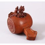 A JAPANESE CARVED WOODEN CARVED KORO, carved in the form of daikoku mallet, with a pierced cover