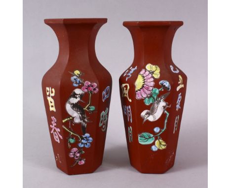 A PAIR OF CHINESE ENAMEL YIXING CLAY HEXAGONAL VASES, the body with display of flora and calligraphy in enamel, the bases wit