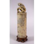 A LARGE CHINESE CARVED SOAPSTONE CYLINDRICAL SEAL WITH A SNAKE, the cylindrical body with a greek