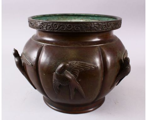 A JAPANESE MEIJI PERIOD BRONZE RELIEF JARDINIERE, with relief bird figures to each panel, and a formal floral border, 24cm x 