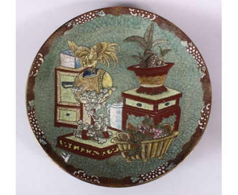 A LARGE 19TH / 20TH CENTURY ORIENTAL CRACKLE WARE CELADON RAISED ENAMEL CHARGER, decorated in raised enamel to depict a flora