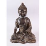 A GOOD CHINESE BRONZE FIGURE OF SEATED BUDDHA, the body with raised decoration of dragons and