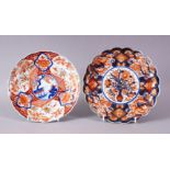 TWO MEIJI PERIOD IMARI PLATES, 20cm and 22cm.