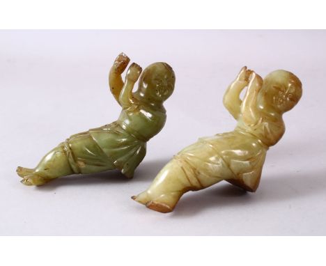 TWO 19TH/20TH CENTURY CHINESE CARVED JADE FIGURES OF BOYS, both once possibly holding an instrument and form a larger piece, 