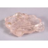 A CHINESE CARVED TRANSLUCENT ROSE QUARTS LOTUS FORM DISH, with a pale rose colour with frosted