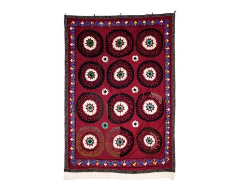 A SUZANI PANEL  LATE 19TH CENTURY  Dark purple ground  220cm x 156cm   Condition Report:  Creasing, fold marks, as per age, h