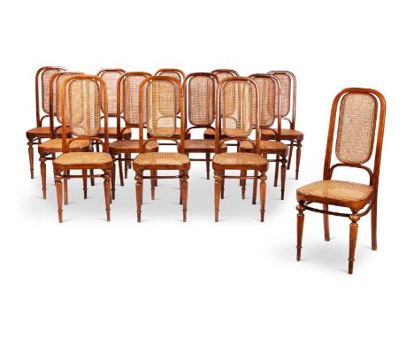 A SET OF THIRTEEN AUSTRIAN BENCHWOOD CHAIRS  MANUFACTURED BY THONET, VIENNA, CIRCA 1890 With caned back and seat, the seat ra