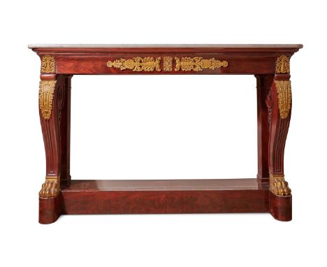 A RESTAURATION ORMOLU MOUNTED MAHOGANY CONSOLE TABLE  FRENCH, EARLY 19TH CENTURY  The white marble top above ormolu mounted f