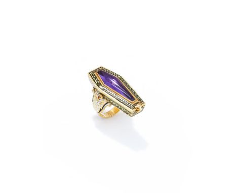 A MACABRE MEMENTO MORI RING  ATTILIO CODOGNATO, CIRCA 2007    The coffin shaped compartment with central cabochon amethyst ab