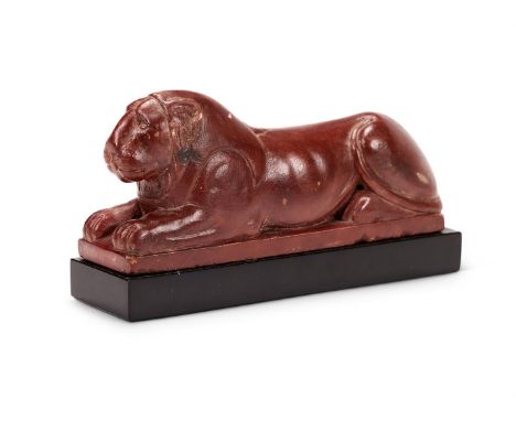 AFTER THE ANTIQUE- A GRAND TOUR ROSSO ANTICO EGYPTIAN LION  LATE 19TH/EARLY 20TH CENTURY  On a later base  6cm high overall, 