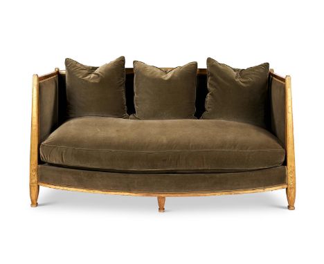 AN ART DECO GILTWOOD SOFA  FRENCH, CIRCA 1930 Upholstered in green velvet with three loose cushions, the frame decorated with