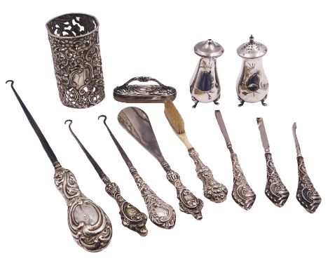 Group of silver, comprising two Victorian silver handled button hooks, hallmarked Birmingham 1900, and an Edwardian example, 