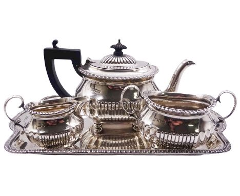 Late Victorian three piece bachelors tea service, comprising teapot with ebonised handle and finial, twin handled sucrier, an