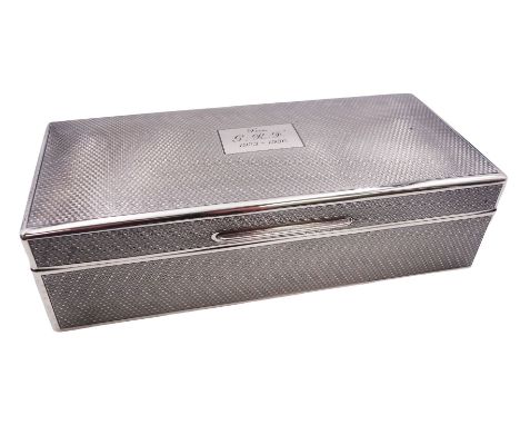 1920's silver mounted cigarette box, of rectangular form with engine turned decoration to the exterior, the hinged cover with