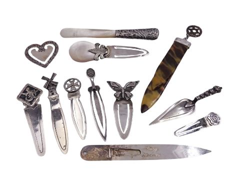 Collection of twelve silver and silver mounted page markers, to include example of trowel form, one of heart shaped form, ano