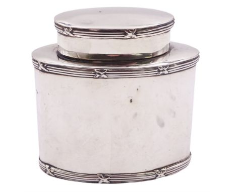 Edwardian silver tea caddy, of plain oval form with reed and ribbon border to the body and cover, hallmarked Deakin & Francis