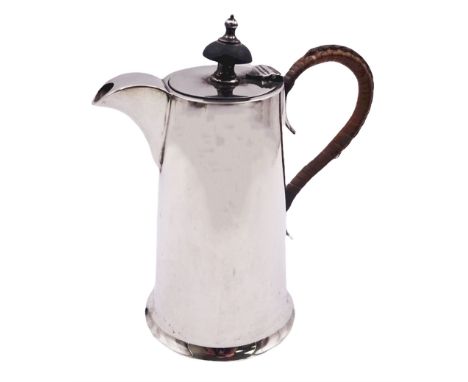 1920's silver hot water pot, of plain tapering cylindrical form with wicker bound curved handle, and ebonised finial to hinge