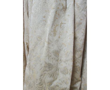 CURTAINS, a pair, woven gold patterned fabric with associated swags, 228cm gathered by 340cm drop. (Qty)
