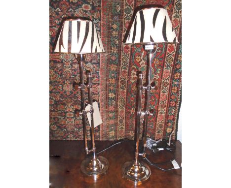 TABLE LAMPS, a pair, silver plated with faux zebra skin lamp shades, adjustable action, 74cm H. (2)