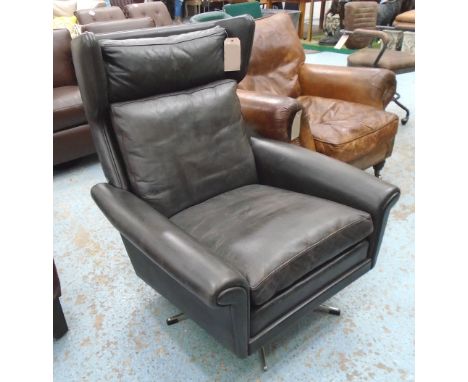 EASY ARMCHAIR, 1970's vintage black hide revolving on a five point base, 87cm W. 