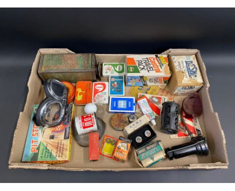 A tray of assorted tins, packaging, automobilia and advertising items, including a Castrol square caddy can, playing cards et