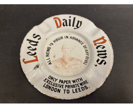 A Leeds Daily News 'Boer War' themed enamel ashtray, 5 1/2" diameter.