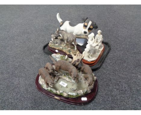 Two Juliana Collection figure groups, Otter family and Donkey with foal, together with a further two figures, Seesaw lovers a