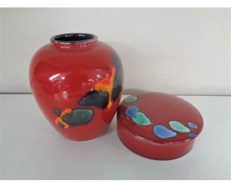 A Poole pottery Odyssey lidded powder bowl and vase.  