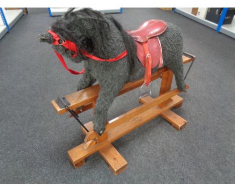 A Pegasus Toys rocking horse. 