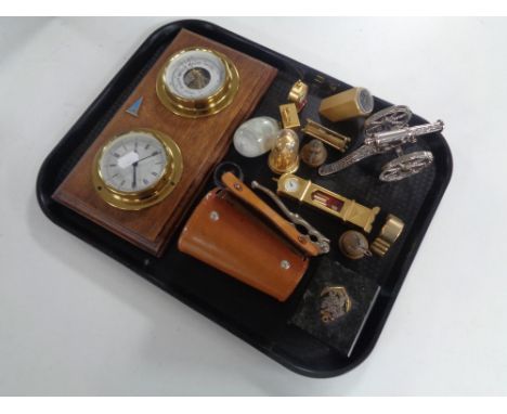 A tray containing ship's style barometer and clock mounted on a board, paperweight bearing Welsh naval badge, leather cased p