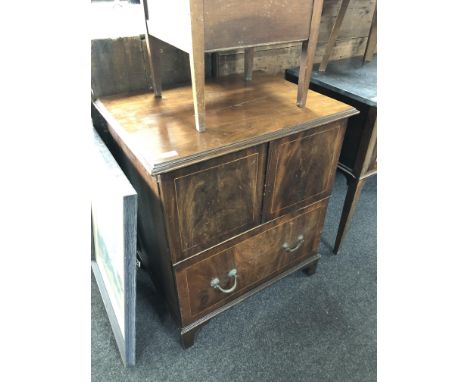A Victorian inlaid mahogany commode chest 